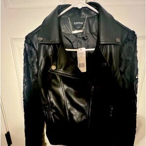 Brand Bebe, vegan leather jacket size small with crochet sleeves